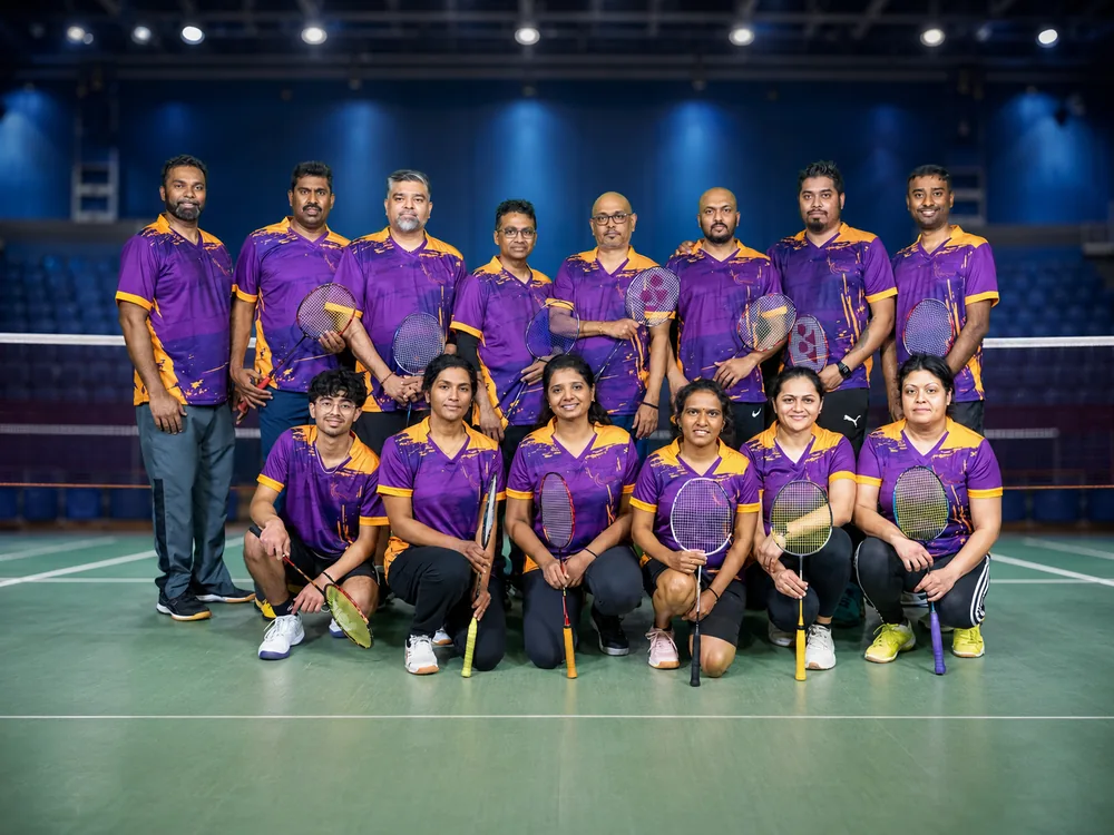 Toronto Smashers team in purple and gold jerseys posing in the arena