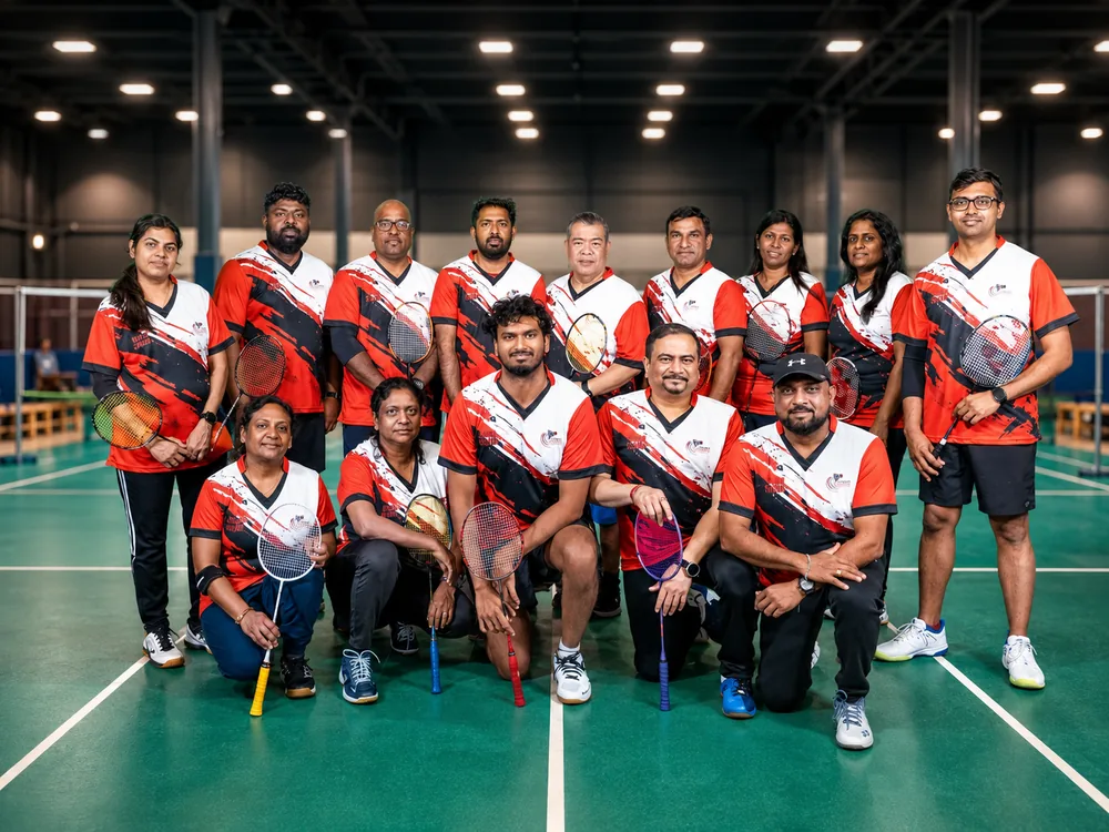 Toronto Smashers team in red, white and black jerseys posing after their matches